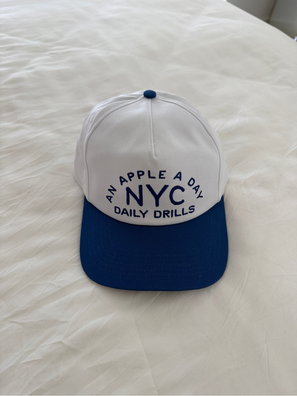 NWT- Daily Drills 'An Apple A Day' Baseball Cap in White and Blue